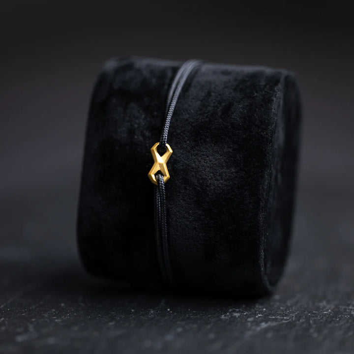 Nylonarmband 1,5 mm, schwarz, Infinity-Zeichen vergoldet