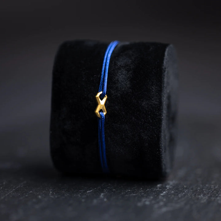 Nylonarmband 1,5 mm, blau, Infinity-Zeichen vergoldet